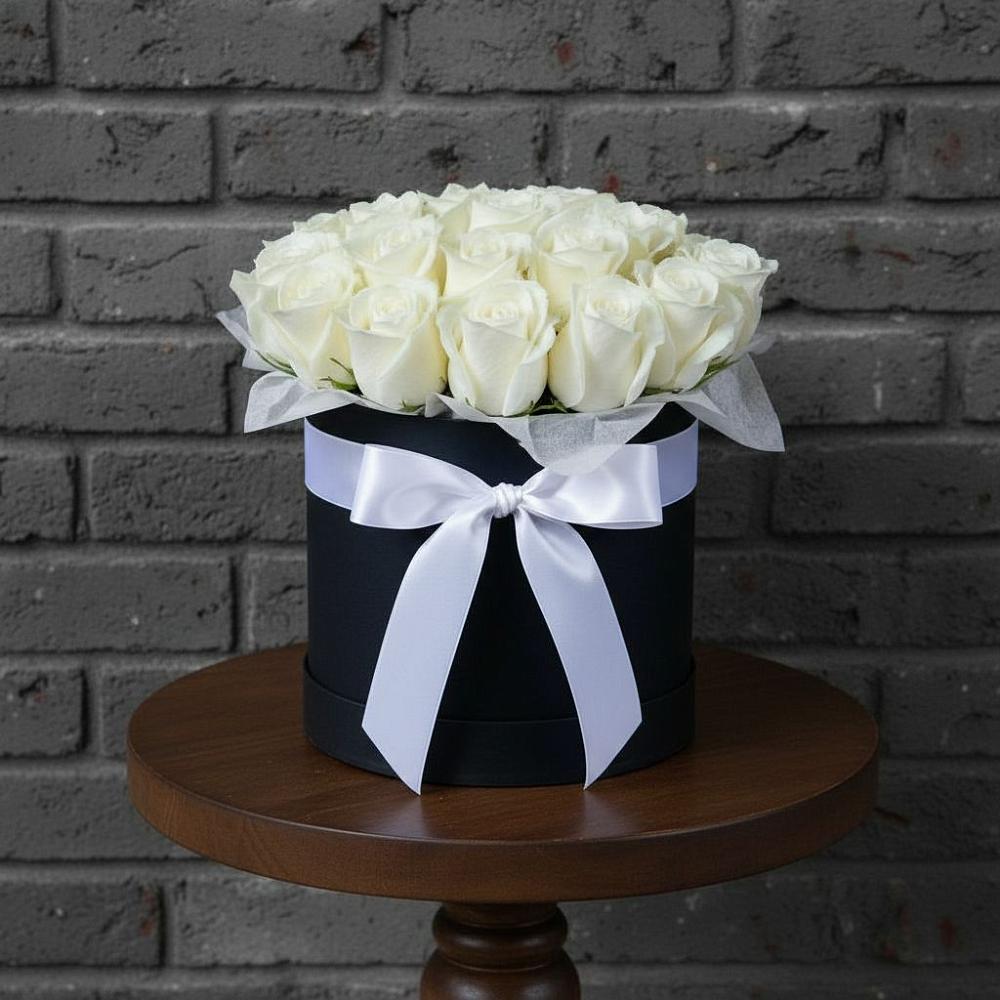 Цветочная композиция из Розы в шляпной коробке в Таежный